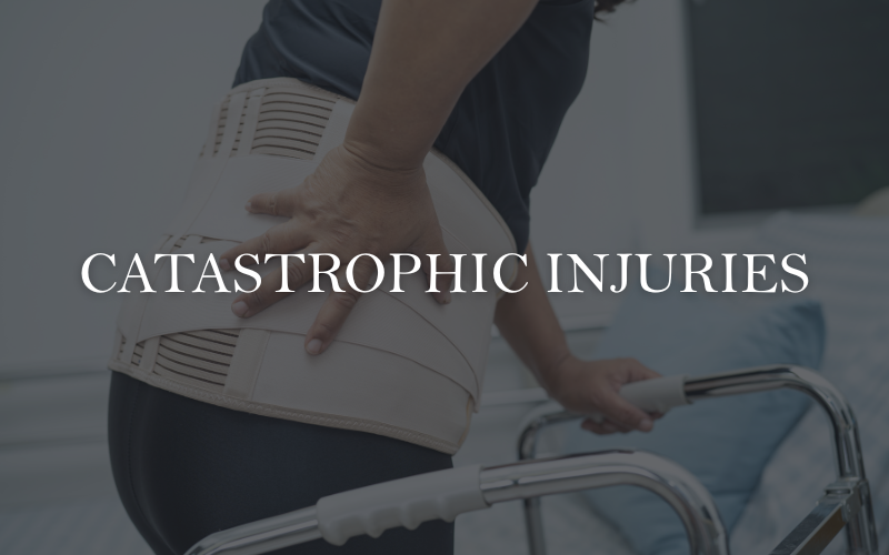 Person in a wheelchair being assisted by a caregiver — symbolizing catastrophic injury cases. Personal injury attorneys advocate for clients facing life-altering injuries such as spinal cord damage, traumatic brain injury, or amputation due to negligence.