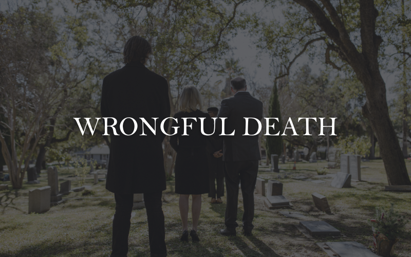 Grieving family at a memorial site — representing wrongful death claims handled by compassionate personal injury attorneys. Legal teams help families seek justice and financial compensation after losing a loved one due to negligence or fatal accidents.